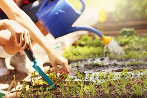 Gardening safety policy introduction with team working carefully