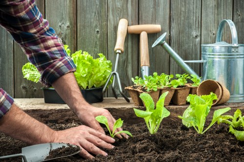 Gardening team preparing a UK garden service booking